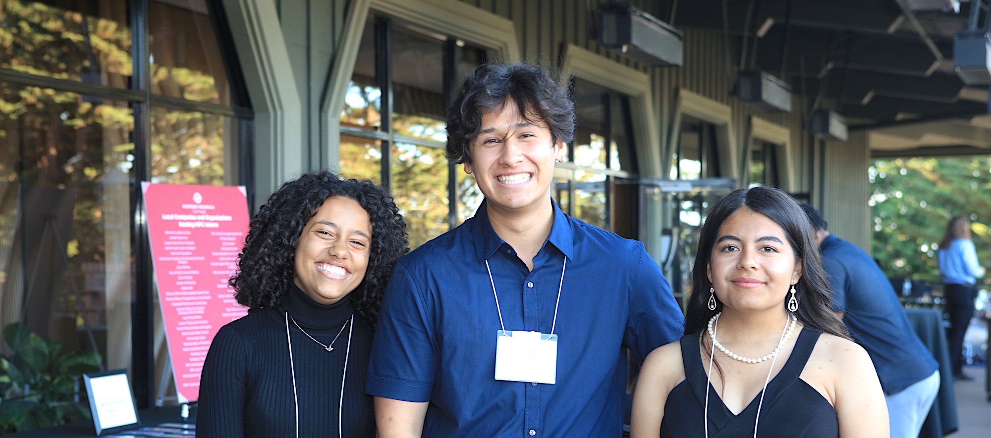 Group of MPC Students Talking Outside on Campus Bridge